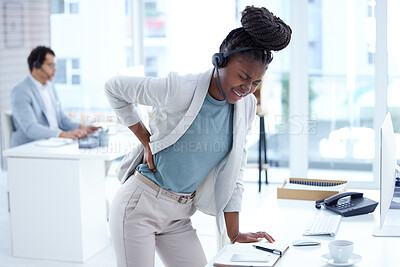 Buy stock photo Stress, tired and call center woman with back pain, burnout or health problem in customer care or sales. Black female crm or support agent or consultant with injury, backache or stretching muscle