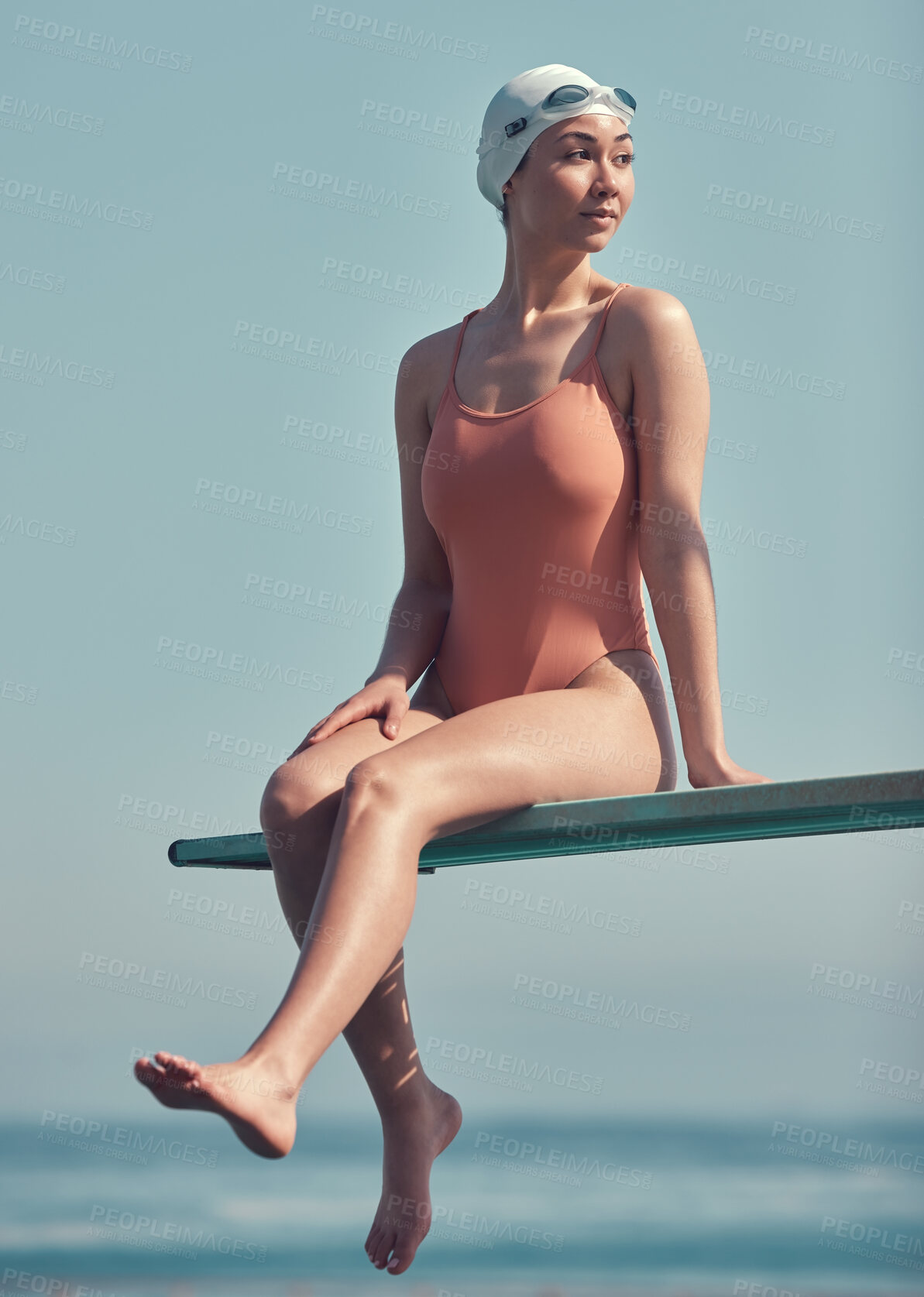 Buy stock photo Woman, swimmer and relax on diving board with sports training, reflection and practice for competition. Active, female person and diver thinking with wellness, fitness or balance outdoor on platform.