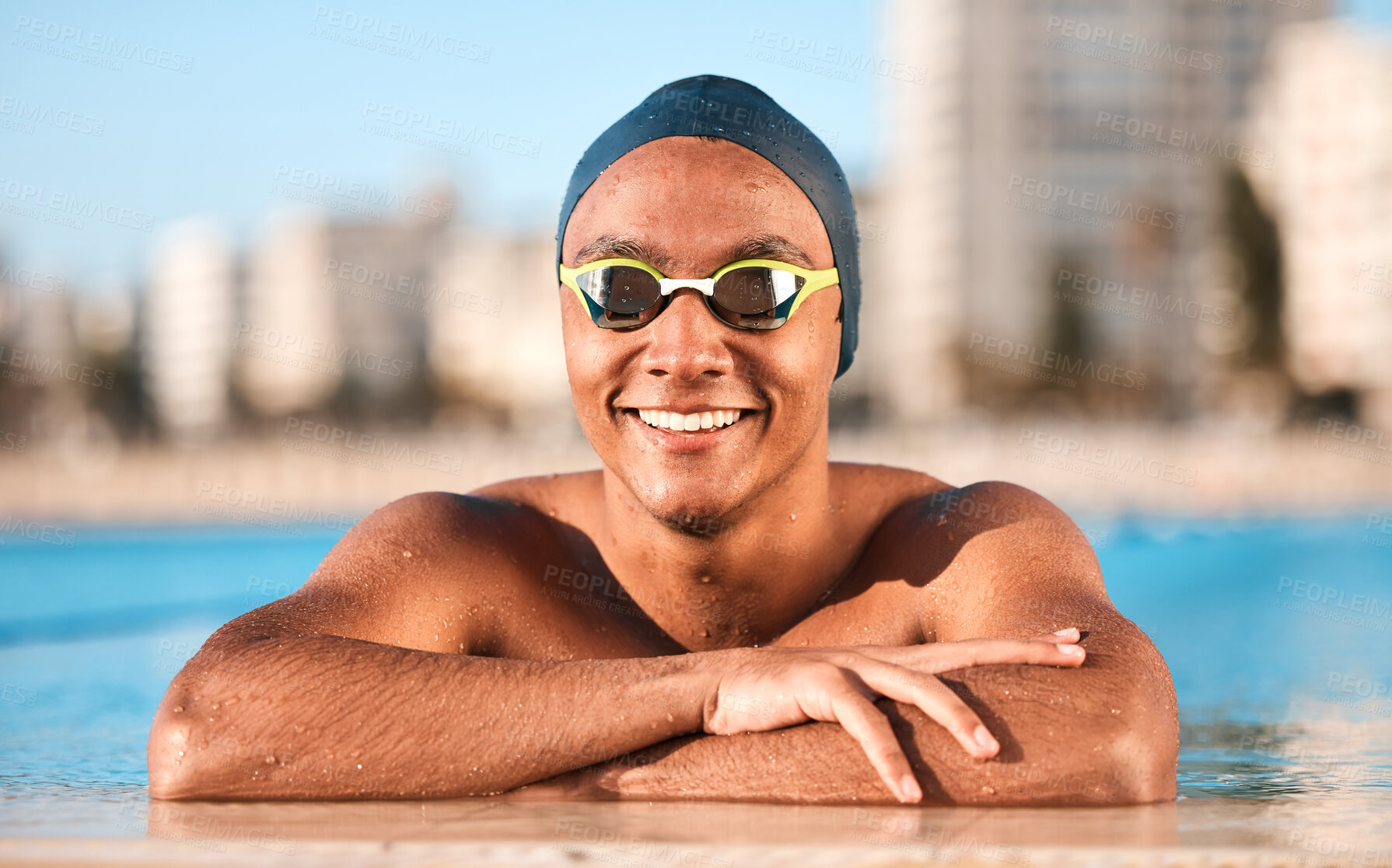 Buy stock photo Shot of a handsome young male athlete swimming in an olympic-sized pool