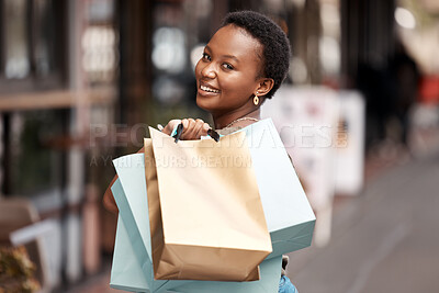 Buy stock photo Smile, city and portrait of black woman with shopping bag for boutique deal, commerce and giveaway. Happy, person and customer with designer clothes for luxury discount, retail and sale in Nigeria