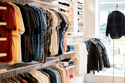 Buy stock photo Shot of an empty clothing boutique with the latest clothing selection