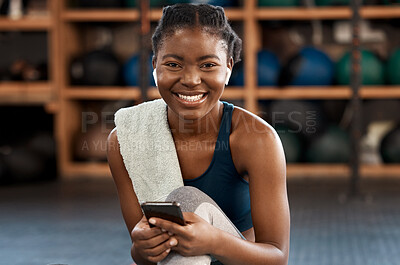 Buy stock photo Happy black woman, fitness and portrait with phone for social media, communication or networking at gym. Face of African female person typing, texting or chatting on smartphone after workout exercise