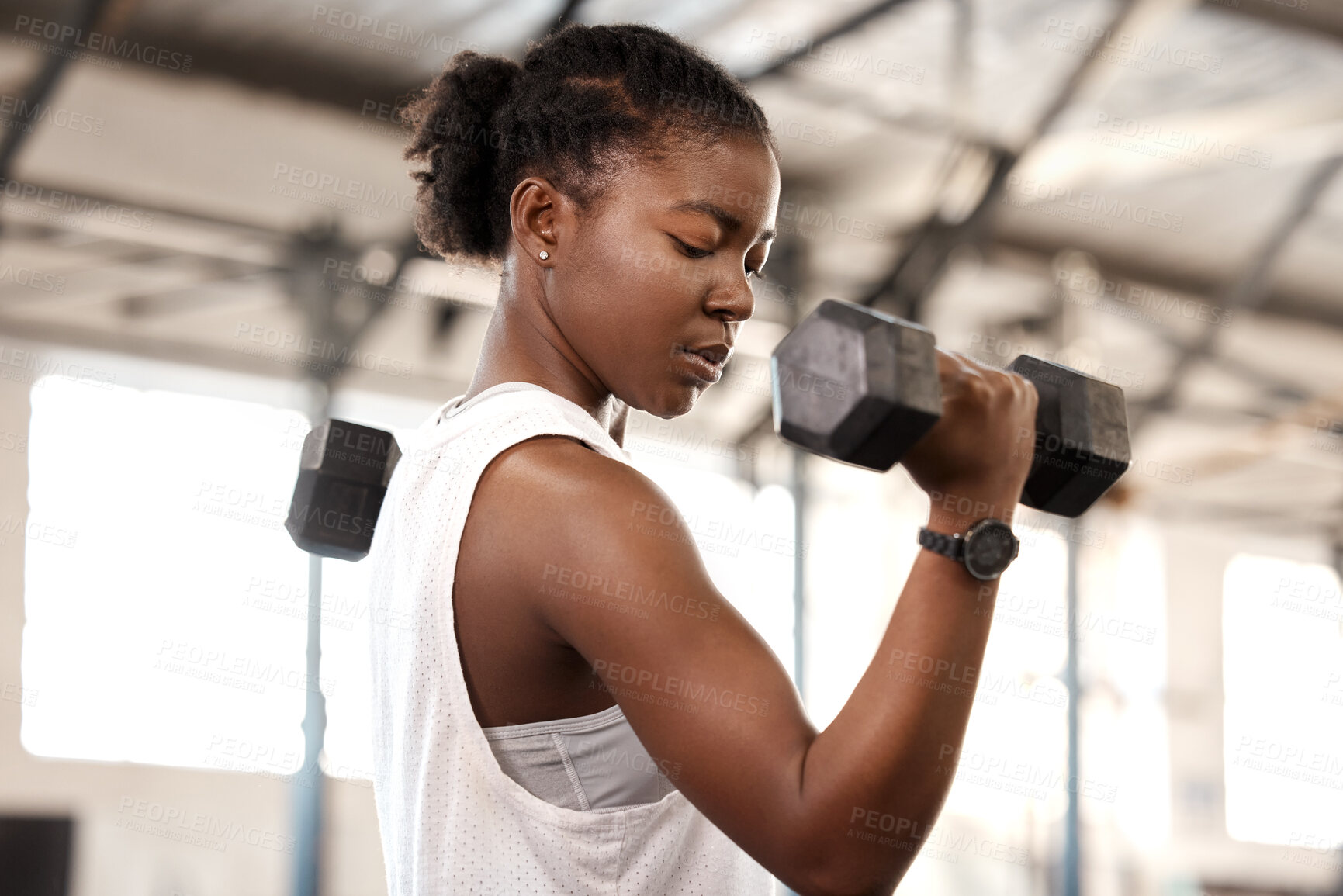 Buy stock photo Weightlifting, dumbbell and training with black woman in gym for workout, strong and muscle. Exercise, weights and sports equipment with female bodybuilder in fitness center for challenge and health