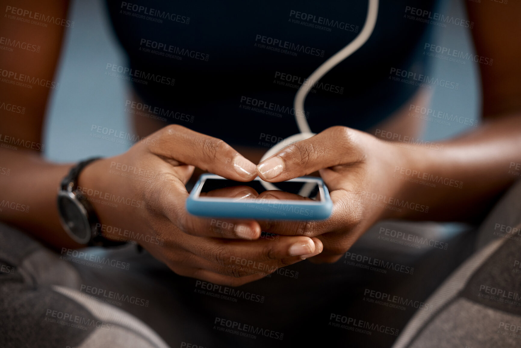 Buy stock photo Woman, hands and phone at gym in social media, networking or communication after workout exercise. Hand of female person or athlete typing, texting or chatting on mobile smartphone app in health club