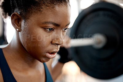 Buy stock photo Closeup, weightlifting and barbell with black woman in gym for workout, strong and muscle. Health, challenge and exercise with female bodybuilder and weights for focus, performance and commitment