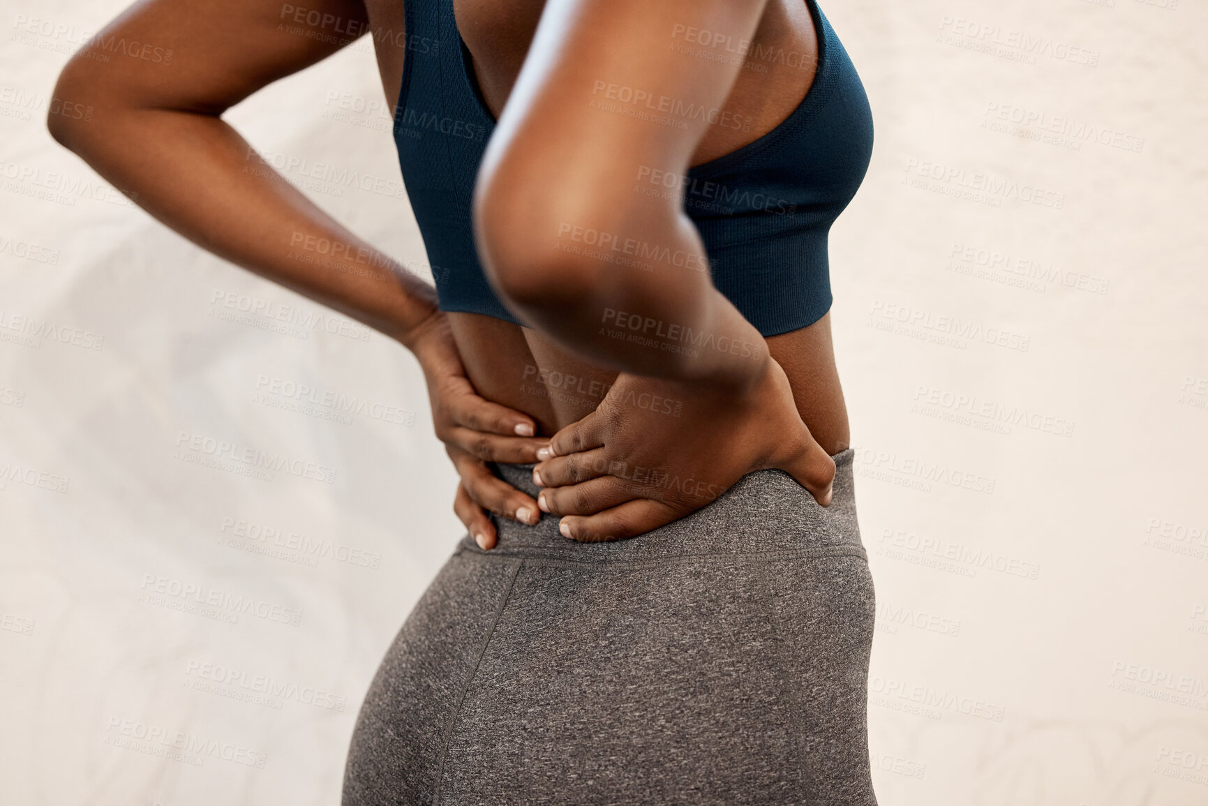 Buy stock photo Back pain, fitness and closeup of black woman in gym for muscle, ache and inflammation. Healthcare, emergency and accident with body of female athlete for burnout, sports injury and spine problem