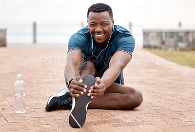 Buy stock photo Stretching legs, fitness and portrait of black man in park for exercise, marathon training and running. Sports, music and male person stretch for warm up, workout and listen to audio for wellness