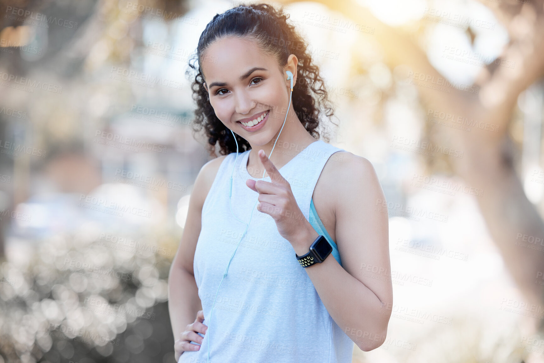 Buy stock photo Woman, portrait and music for outdoor fitness, nature and workout for health and pointing. Female person, morning cardio and earphones for exercise or training for marathon, athlete and run in Brazil