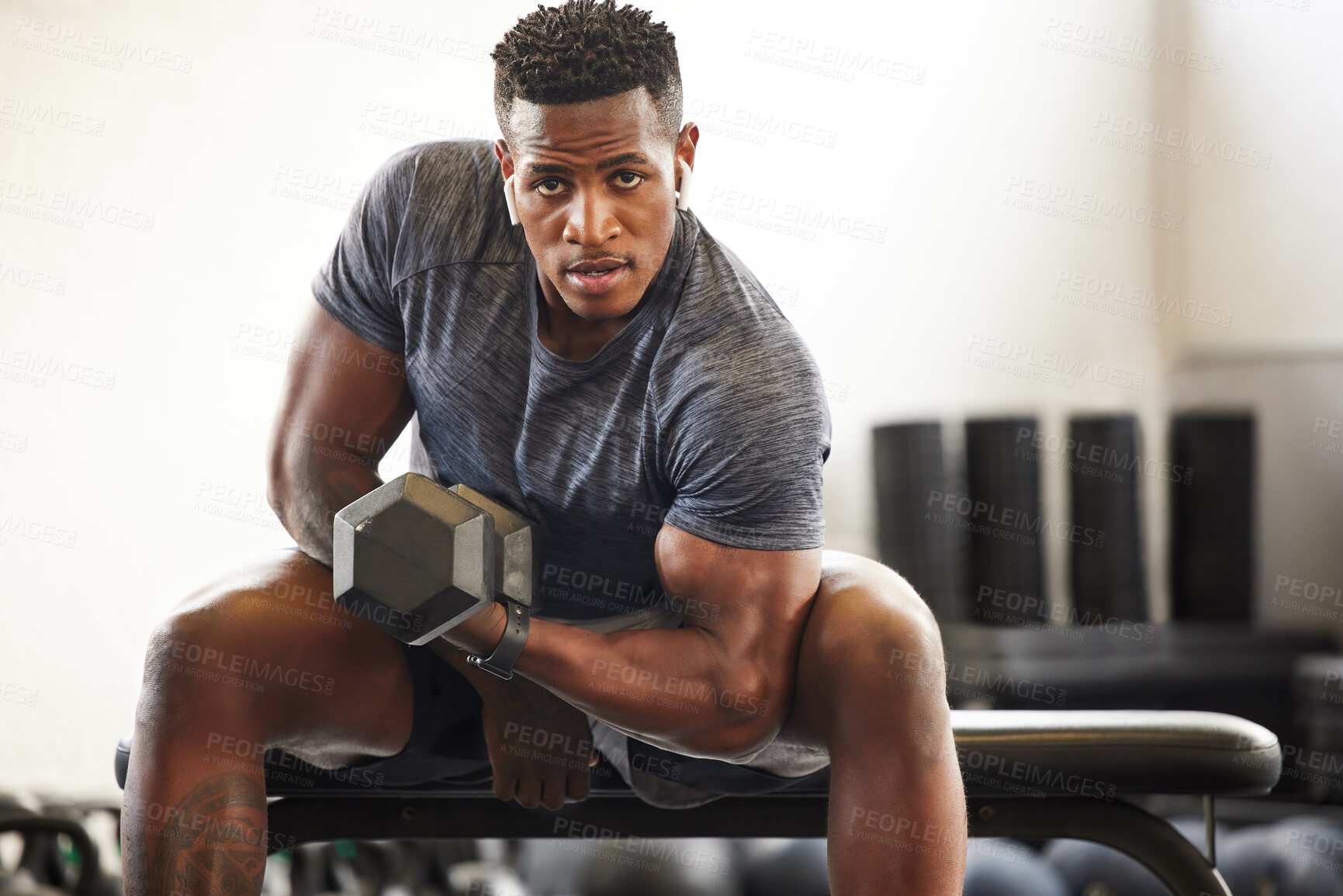 Buy stock photo Black man, bodybuilder and dumbbell in gym portrait for fitness, focus or training for growth, goal or competition. African guy, weightlifting and strong arms for training, wellness and muscle health