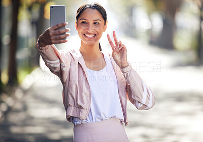 Buy stock photo Fitness, woman and peace sign for selfie outdoor for social media, post update and profile picture with smile. Exercise, happy girl and hand gesture for photography, memory or walking in nature