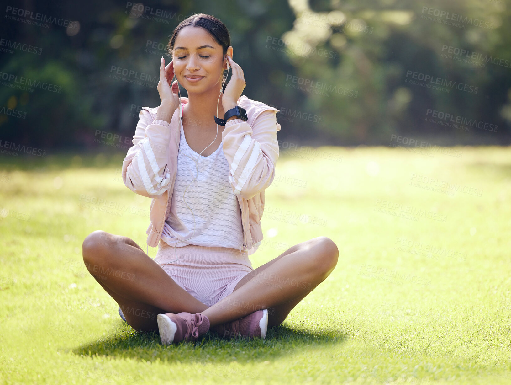 Buy stock photo Relax, woman and music for fitness in park, resting and meditate with smile as routine. Audio, female person and exercise for healthy body, wellness and mental health with headset for sport in nature