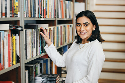 Buy stock photo Woman, student and portrait in university library with smile for searching, learning or knowledge. Happy, female person, notebooks or textbooks in college for research, education and reading books