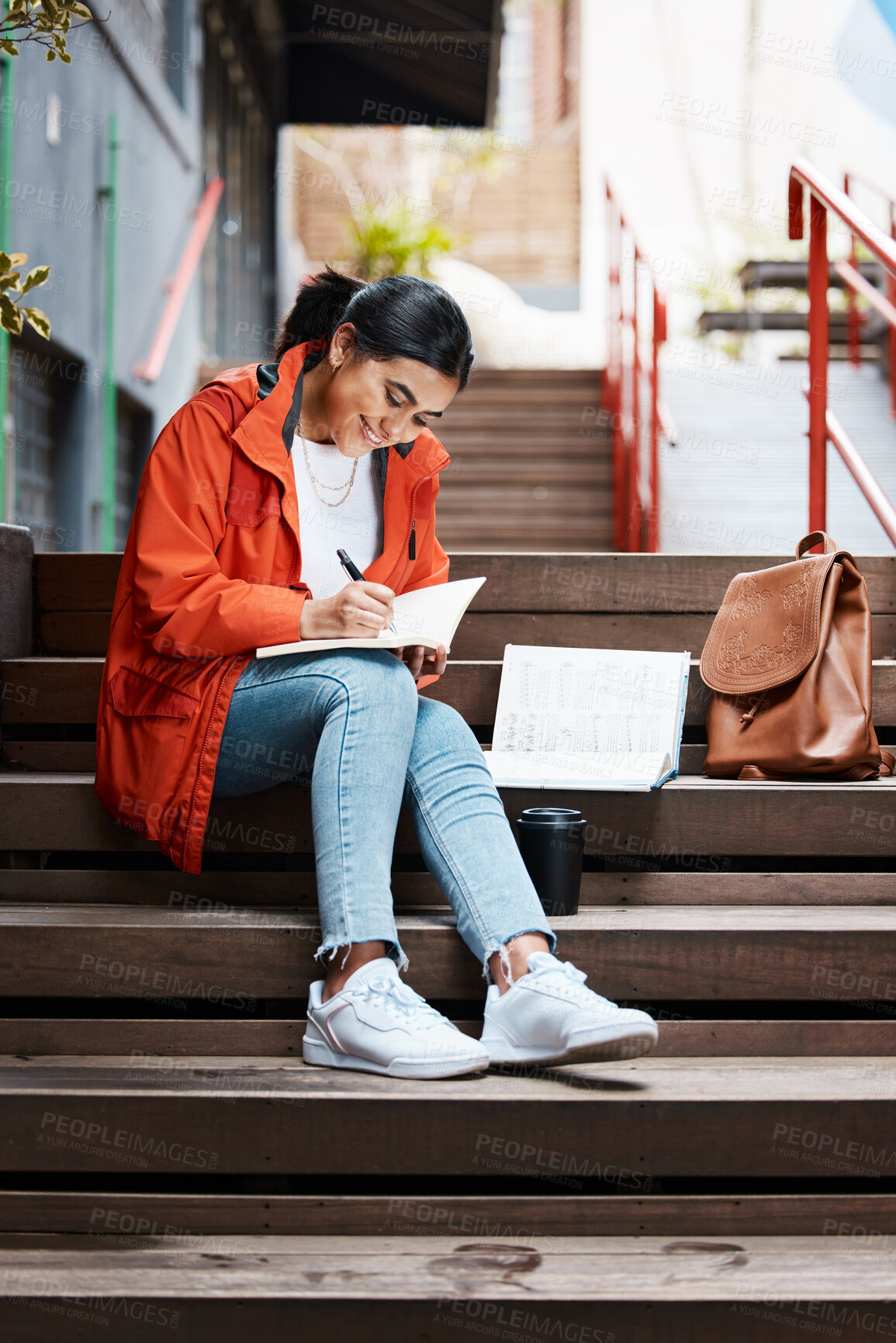 Buy stock photo Shot of a young female student studying at college