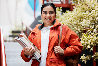 Buy stock photo Books, education and portrait of student Indian girl on campus for learning at college or university. Bag, smile and study with happy academy pupil at school for development, knowledge or scholarship