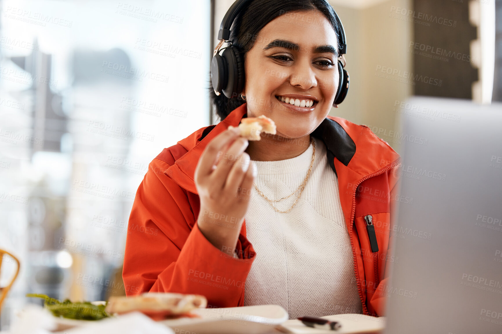 Buy stock photo Happy woman, student and eating by laptop while studying or streaming entertainment at home. Female person with smile on computer for food, study or elearning subscription in remote work at the house