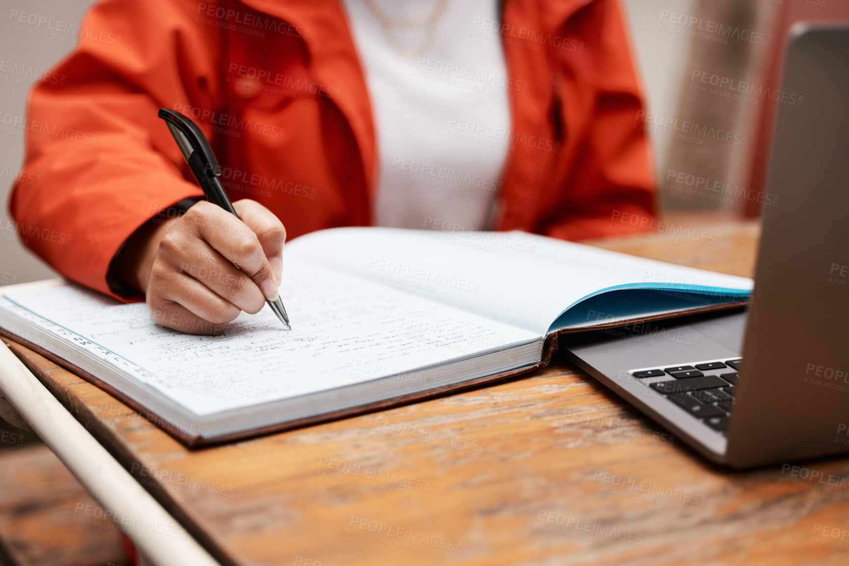 Buy stock photo Shot of an unrecognizable student studying at college