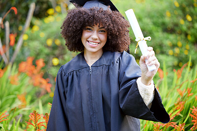 Buy stock photo University, graduation and portrait of  happy woman with diploma for education, achievement or success ceremony on campus. Student, bokeh and person with certificate for satisfaction, smile or event