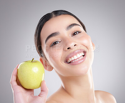 Buy stock photo Apple, skincare and portrait with natural woman in studio on gray background for diet, health or nutrition. Beauty, food or fruit and happy model with fresh produce for organic dermatology or detox