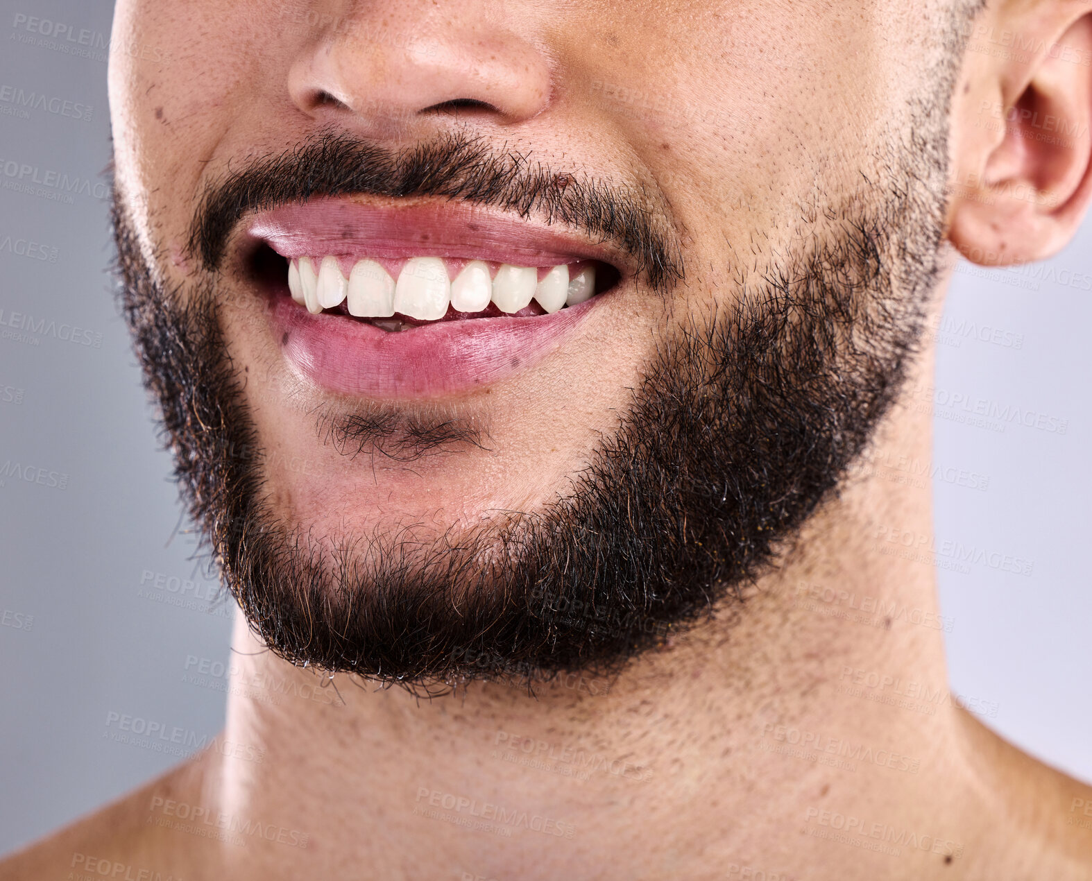 Buy stock photo Mouth, teeth and smile with beard of person in studio on gray background for dental hygiene. Dentist, happy and oral care with confident model closeup for cosmetics, tooth whitening or wellness