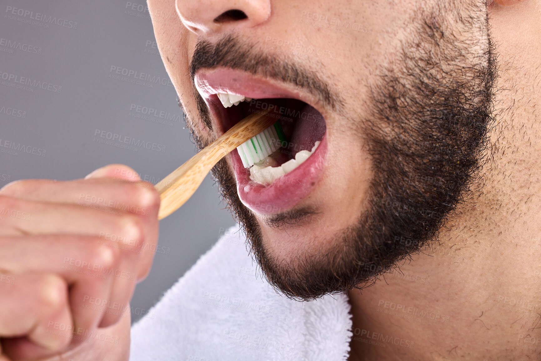 Buy stock photo Close up, man and toothbrush in studio background for oral hygiene, cleaning mouth and medical health. Male person, dental care or whitening teeth for fresh smile, grooming and cavity prevention