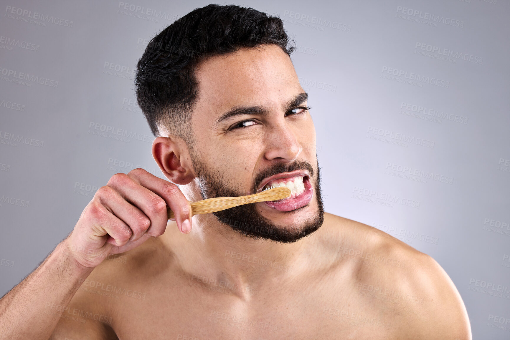 Buy stock photo Portrait, man and toothbrush in studio background for oral hygiene, cleaning mouth and medical wellness. Male person, fresh and bamboo isolated for dental care, grooming and cavity prevention