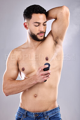 Buy stock photo Body, man and spray with deodorant on armpit in studio for hygiene, scent and wellness. Fragrance, shirtless and male person by white background for grooming, cleanliness and perfume for fresh smell 