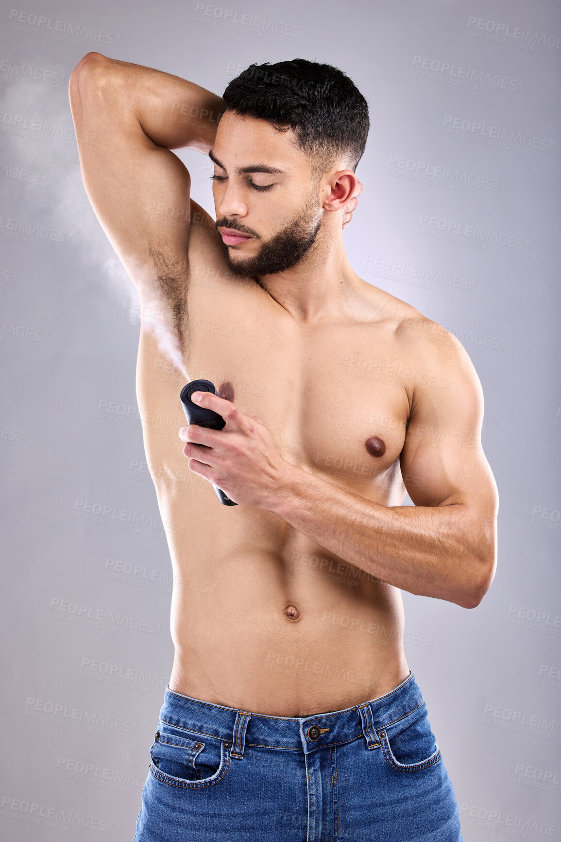 Buy stock photo Body, man and spray with deodorant on armpit in studio for hygiene, fragrance and wellness. Scent, shirtless and male person by white background for grooming, cleaning and perfume for fresh smell 