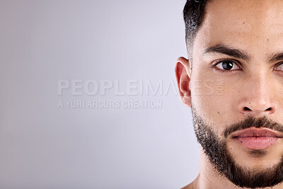 Buy stock photo Beauty, portrait and serious with man in studio on gray background for beard, facial or skincare. Aesthetic, face and wellness with confident model on space for dermatology, grooming or hygiene