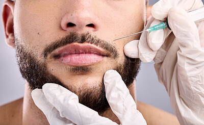 Buy stock photo Man, closeup and aesthetic for lip filler, cosmetic and beauty for skincare with beard and body care. Male person, face and gray background in studio for health, dermatology and injection for glow