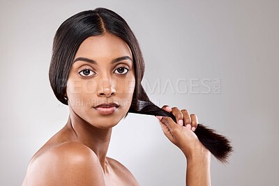 Buy stock photo Portrait, beauty and hair care of Indian woman in studio for skin wellness isolated on white background. Face, hairstyle and confident model in makeup cosmetics at hairdresser salon for glow or shine