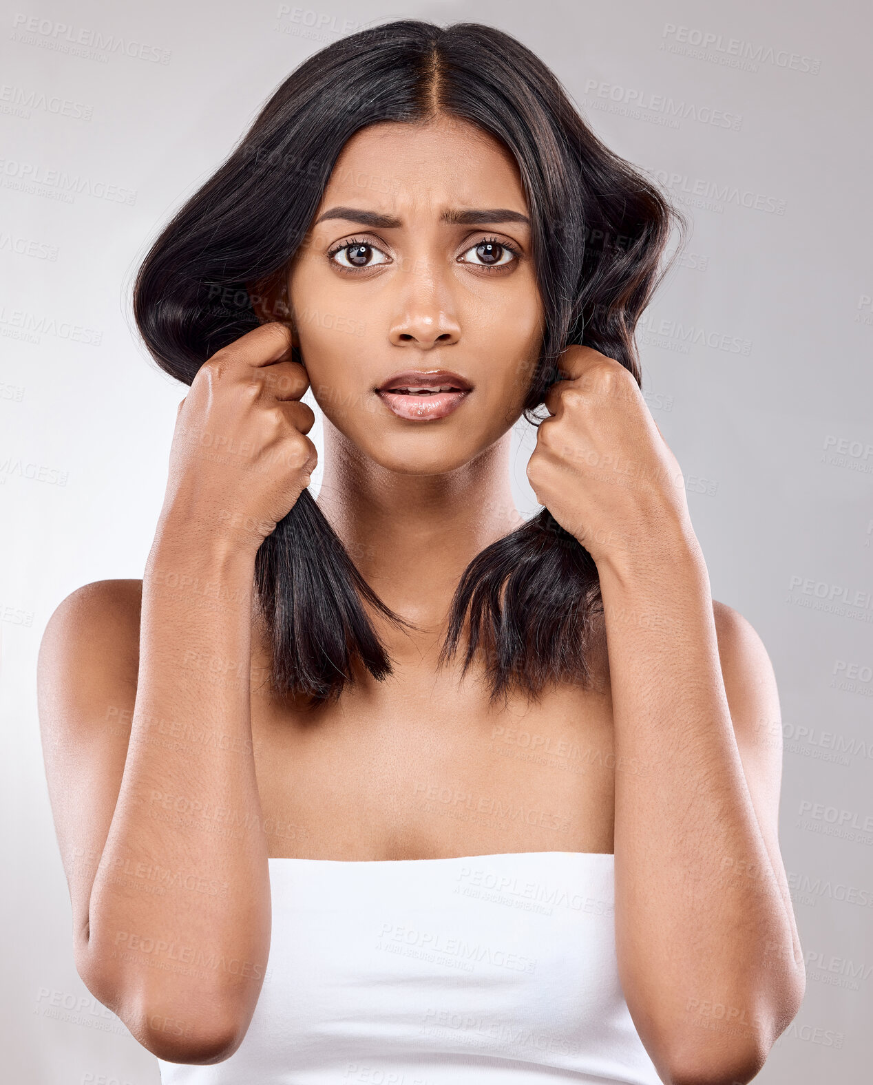 Buy stock photo Portrait, beauty and hair care of woman with problem, damage and split ends in studio isolated on white background. Face, dry hairstyle and serious model in makeup cosmetics at hairdresser salon