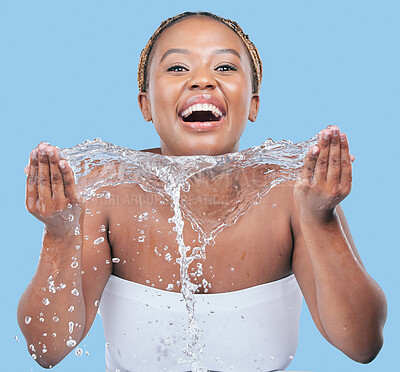 Buy stock photo Portrait, cleaning and black woman washing face, wellness and beauty on blue studio background. African person, face and model with water splash, wet and grooming routine with hygiene and self care