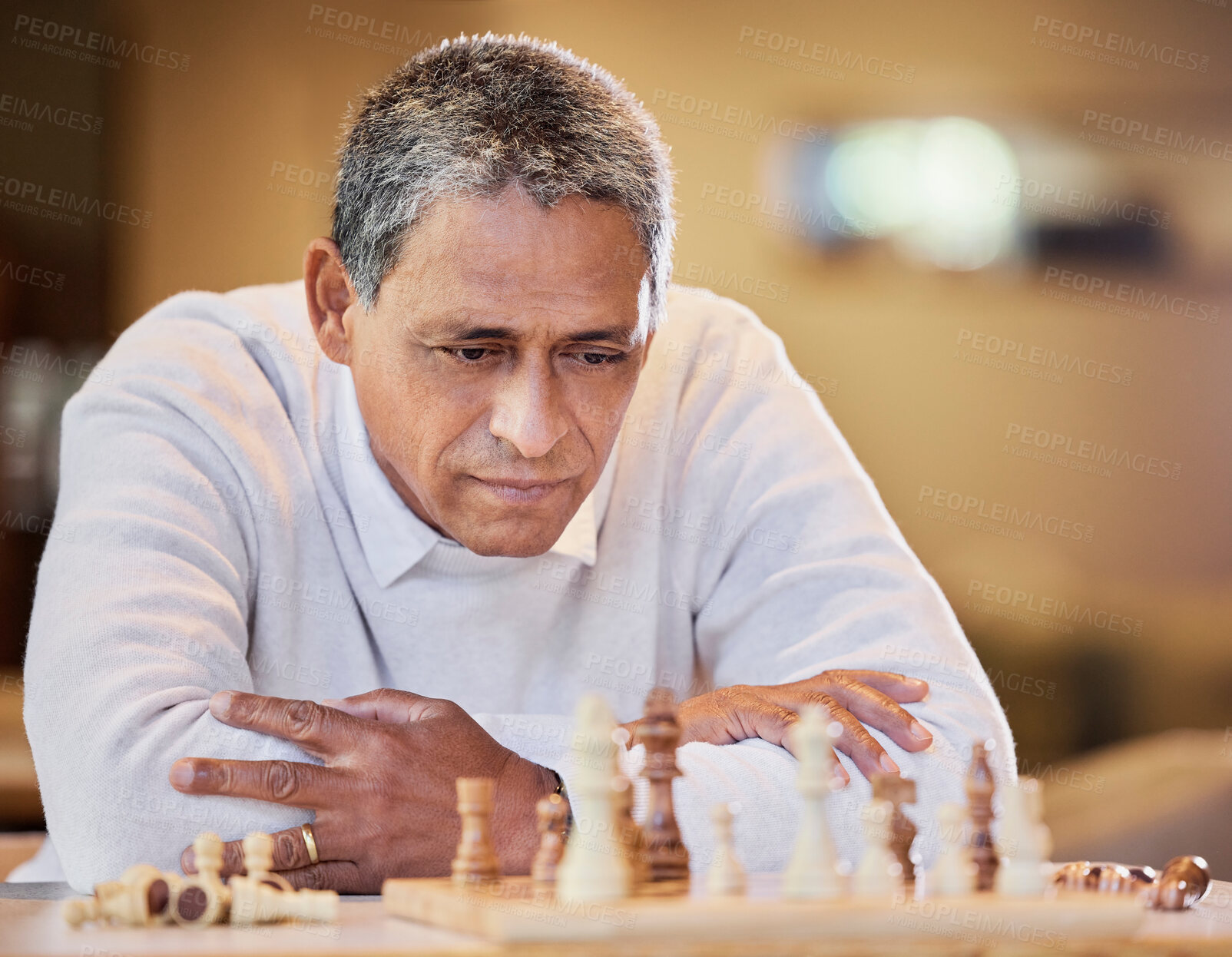 Buy stock photo Mature man, chess and alone with thinking for strategy, outdoor for mental solution to challenge. Male person, park and board game with planning, problem solving with cognitive skills in retirement