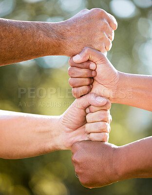Buy stock photo Fist stack, support and team building outdoor with solidarity, power and nature in summer sunshine. Group, people and hands together for trust, teamwork and motivation in park, garden or backyard