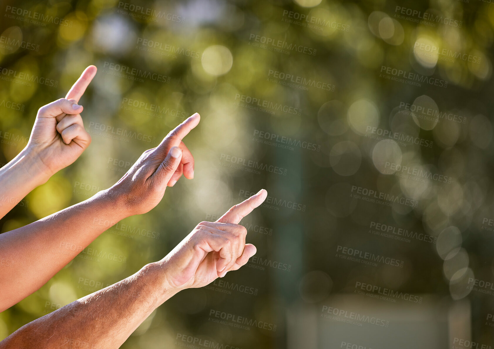 Buy stock photo Pointing, hands and outdoor together for community, workshop and teamwork or collaboration. Support, group or people in nature fingers to the sky for sustainable growth, direction and communication