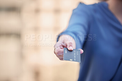 Buy stock photo Shot of a businesswoman using a credit card to make payments