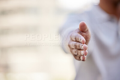 Buy stock photo Shot of a businesswoman with her hand outstretched for a handshake