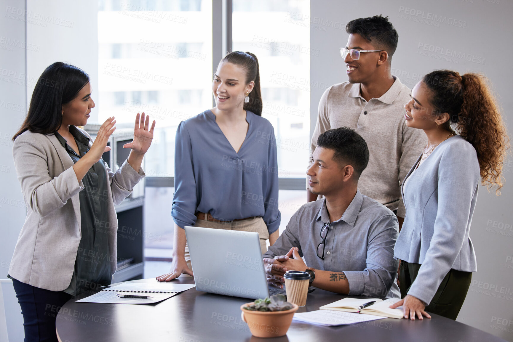 Buy stock photo Shot of a group of businesspeople having a meeting in a modern office