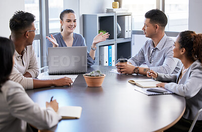 Buy stock photo Shot of a group of businesspeople having a meeting in a modern office