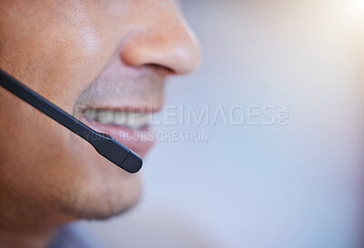 Buy stock photo Closeup shot of an unrecognisable businessman wearing a headset while working in a call centre