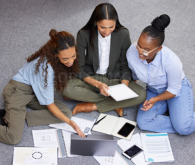 Buy stock photo Shot of a team of businesswomen working together during a meeting