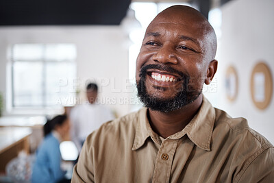 Buy stock photo Shot of a mature businessman looking thoughtful in a modern office
