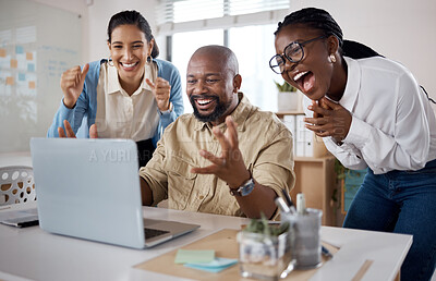 Buy stock photo Shot of a group of businesspeople using a laptop and cheering in a modern office