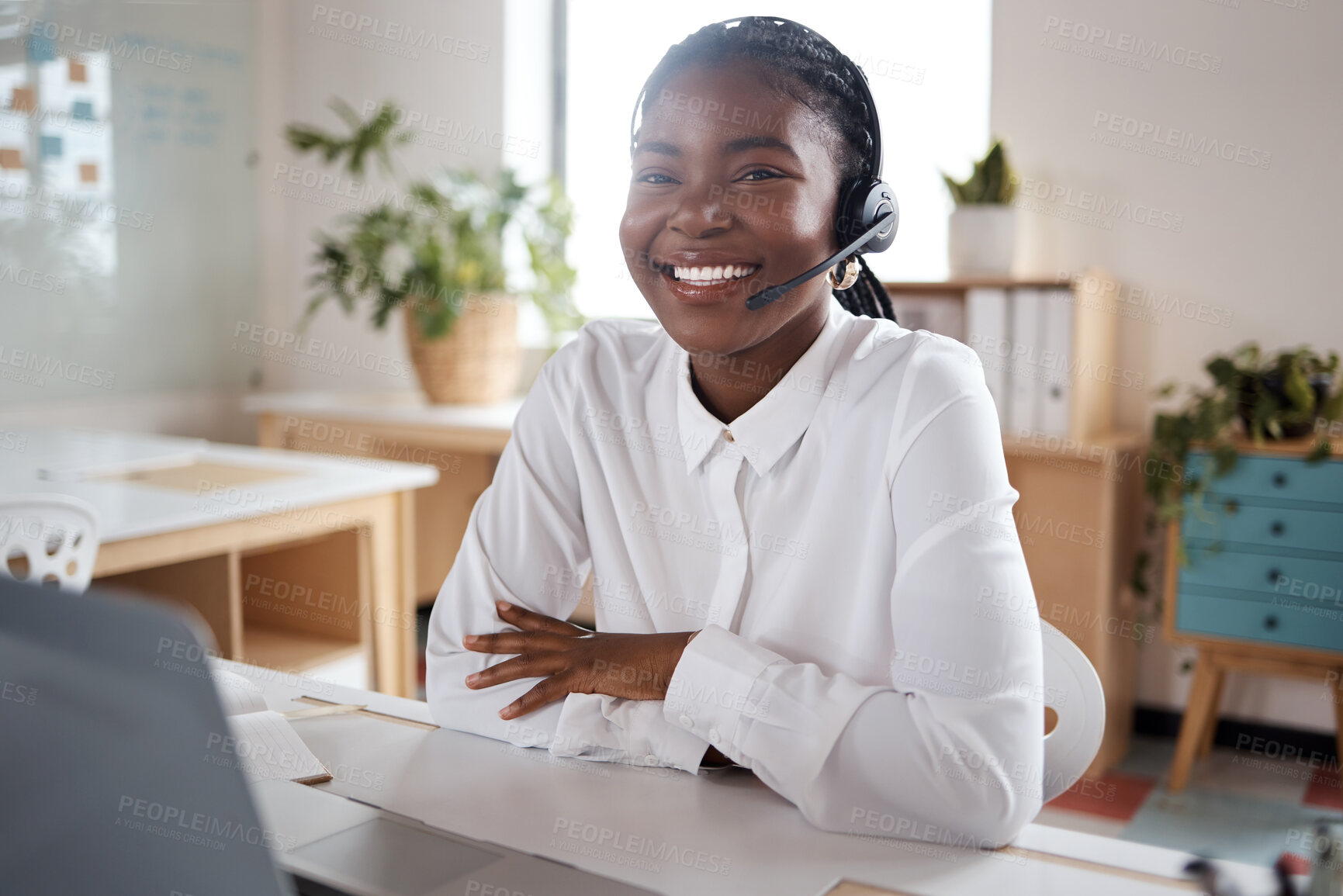 Buy stock photo Shot of a young businesswoman using a headset and laptop in a modern office