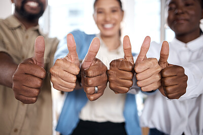 Buy stock photo Shot of a group of businesspeople showing thumbs up in a modern office