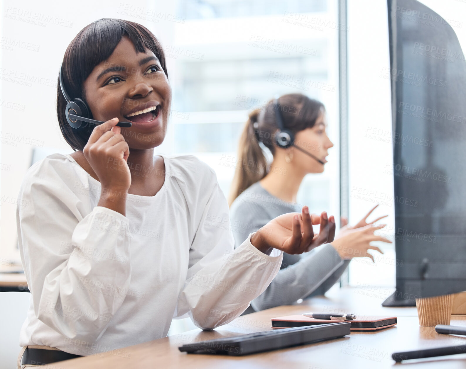 Buy stock photo Shot of a young businesswoman working on a computer in an office