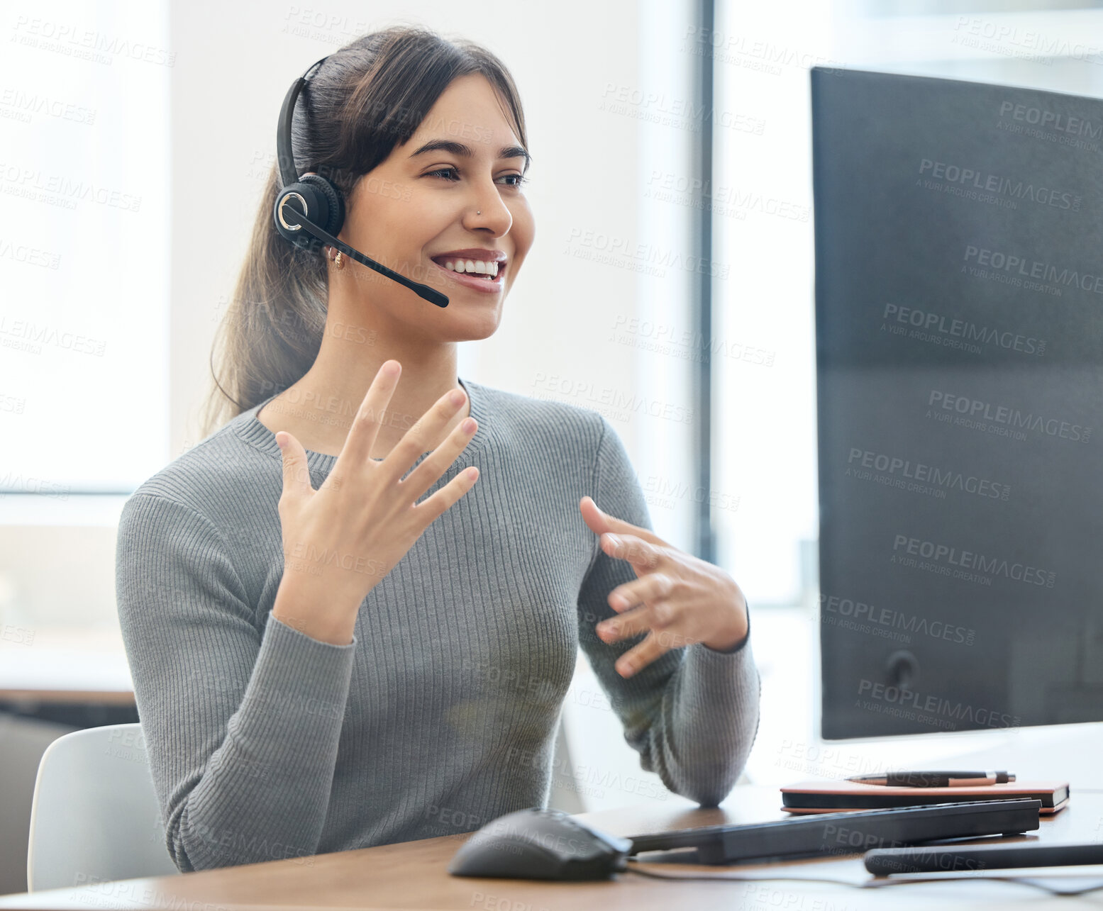 Buy stock photo Call center, talking and woman with headset, computer and customer service in office and hand. CRM, telemarketing and person with tech support, speaking and agent on desk in agency and working