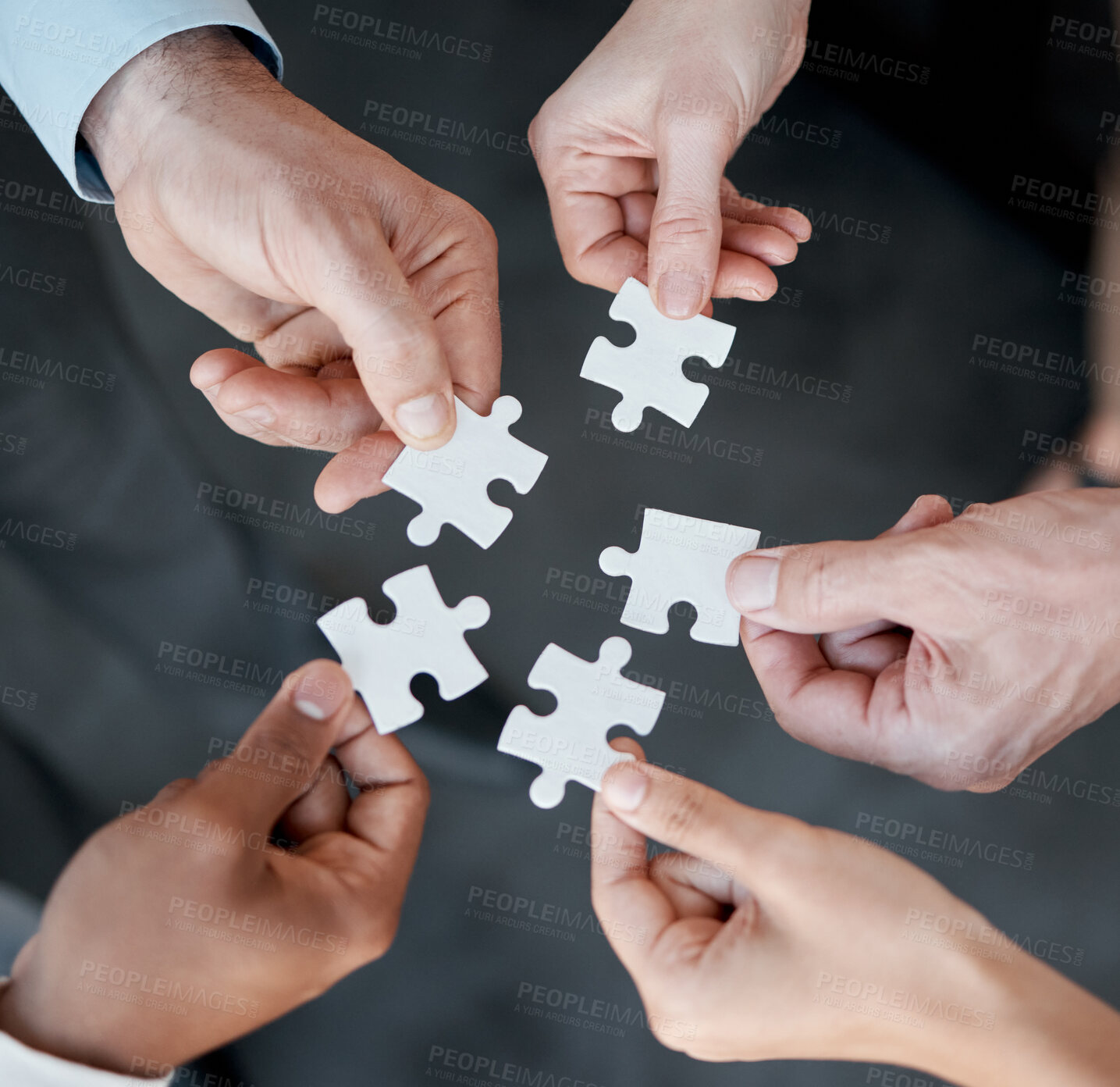 Buy stock photo Hands, puzzle and above for collaboration in office with business people, support or connection for solution. Group, scrum and jigsaw with synergy, strategy and problem solving with link in workplace