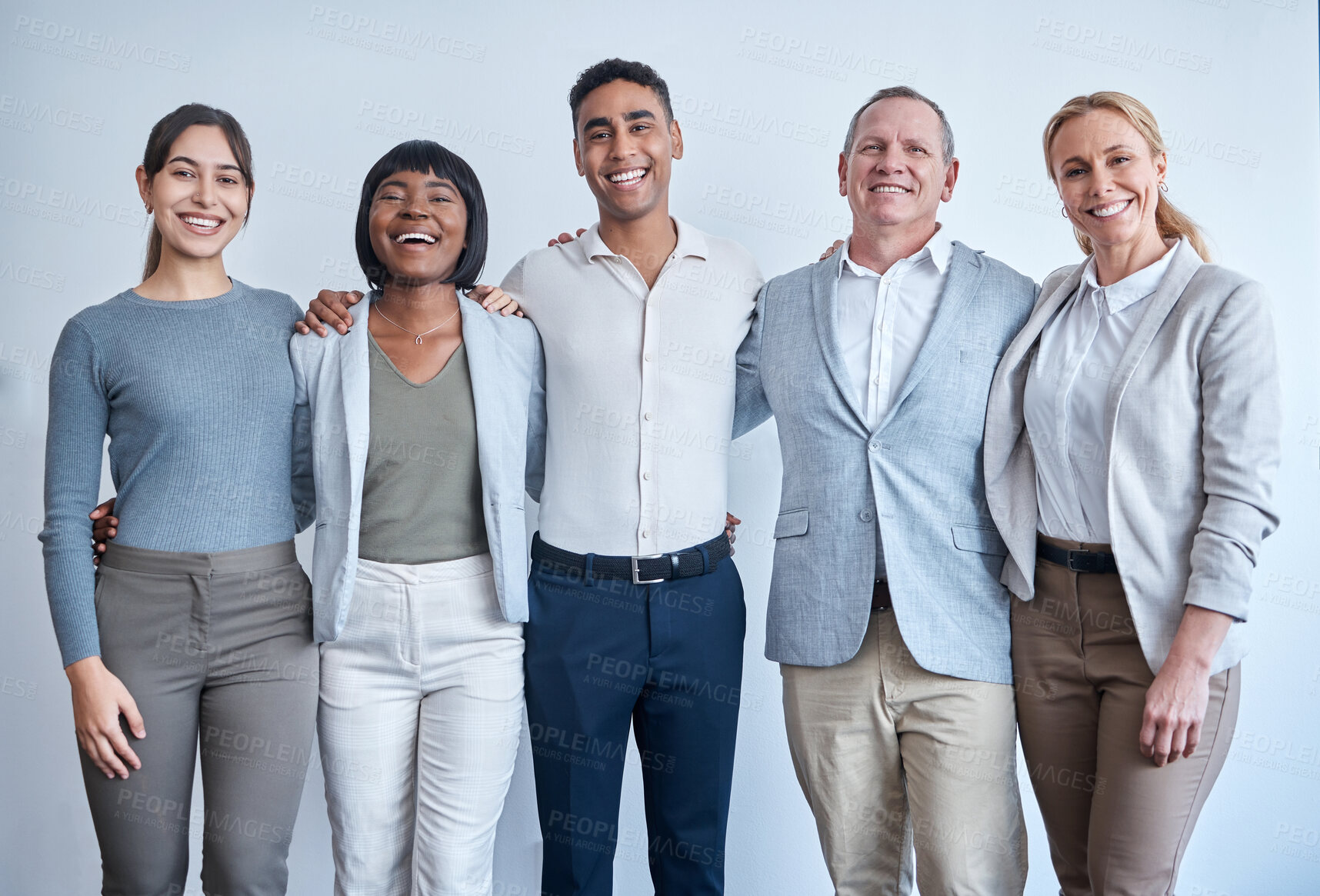 Buy stock photo Hug, teamwork and portrait of business people in office for about us, collaboration and partnership. Corporate, diversity and happy men and women in studio for professional career, company and pride