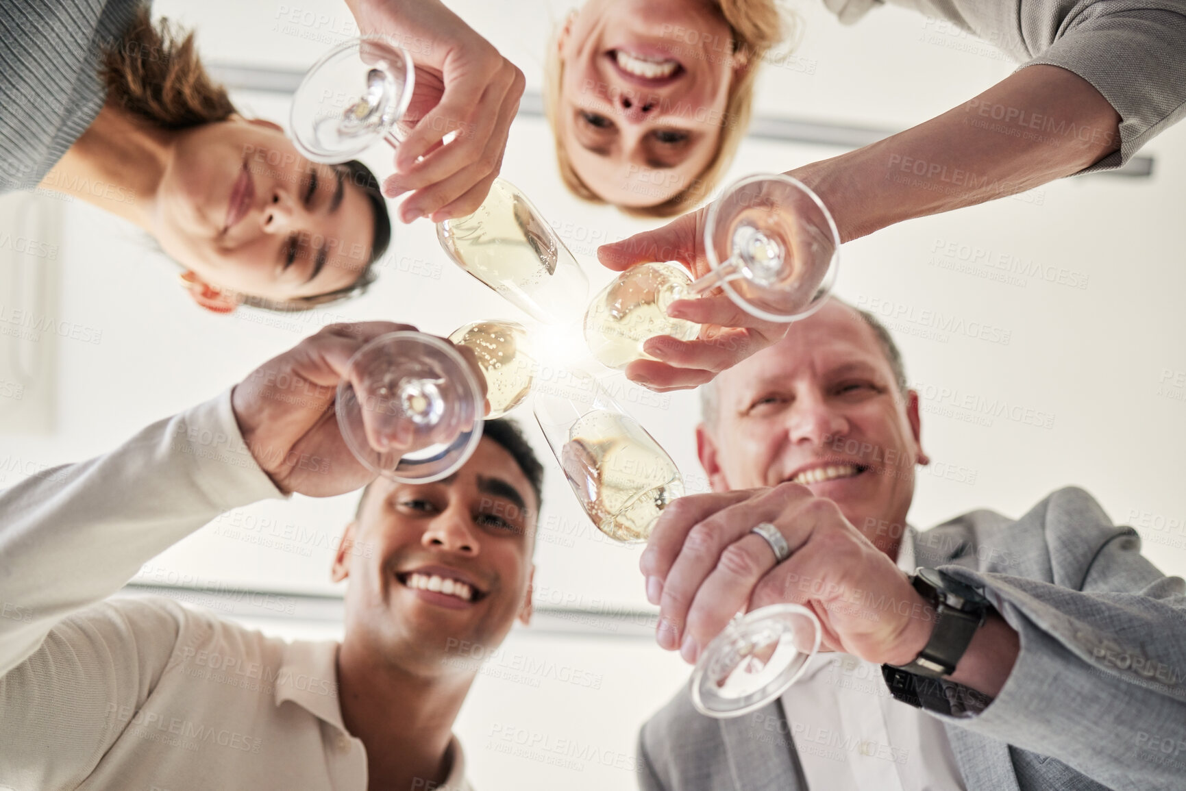 Buy stock photo Business people, champagne and party in office with low angle, portrait or excited in circle for event. Men, women and glasses for alcohol, goals and happy with team celebration for success in scrum